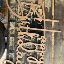 Custom cut wooden lettering in progress
