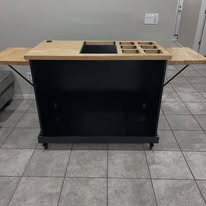 Wooden bar cart on wheels